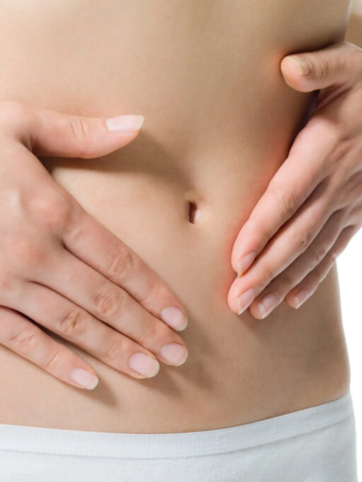 Hands touching a female belly