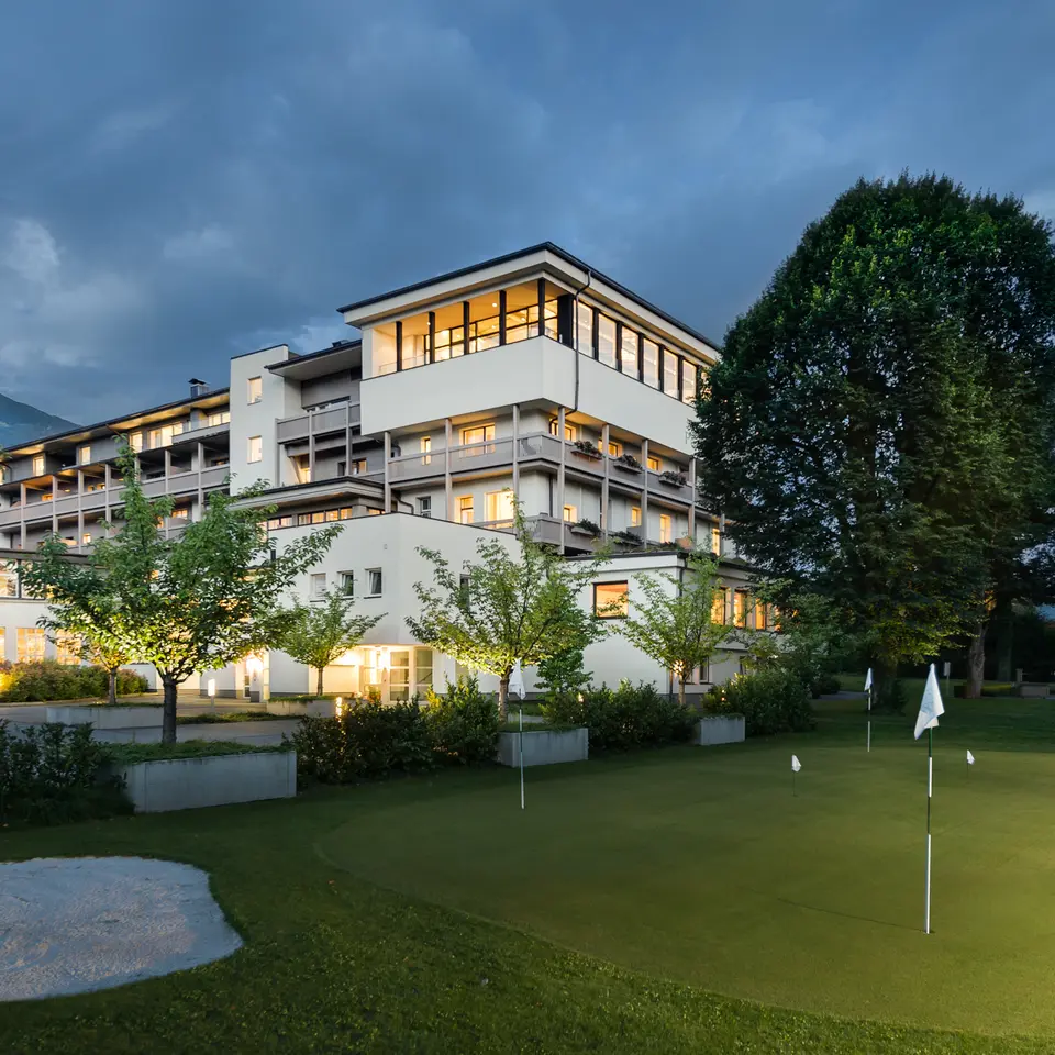 Park Igls exterior view in summer with golf course 
