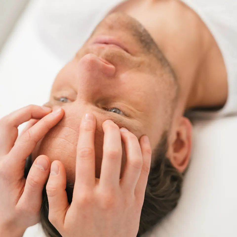 Man in forehead massage