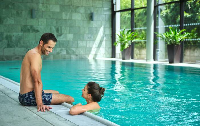 Indoor pool with guest