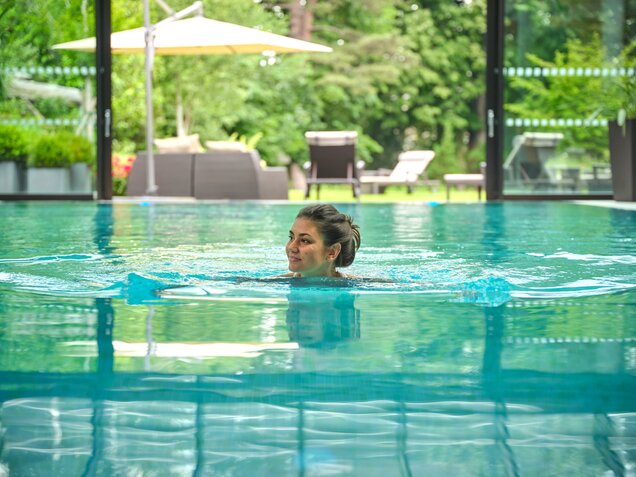 Indoor pool with guest