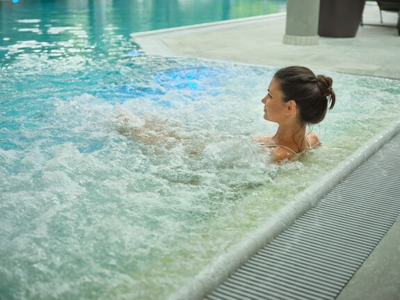 Indoor pool with guest