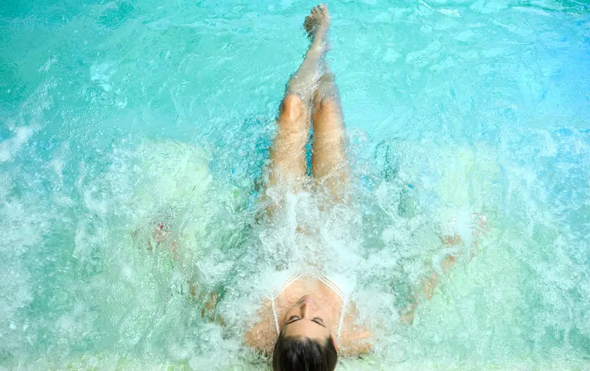 Indoor pool with guest