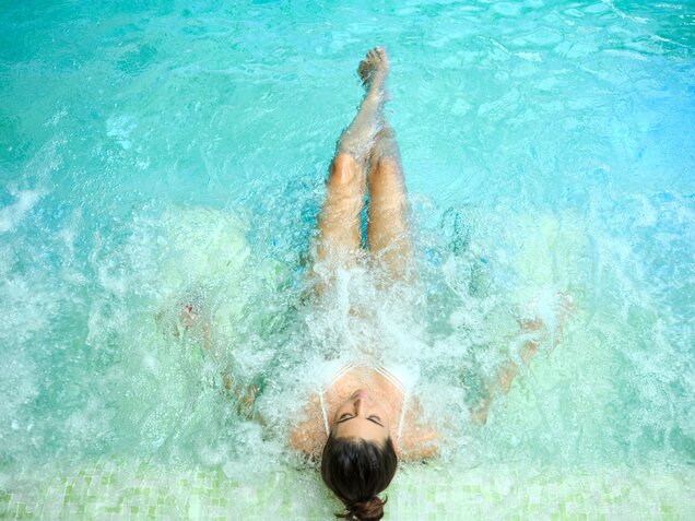 Indoor pool with guest