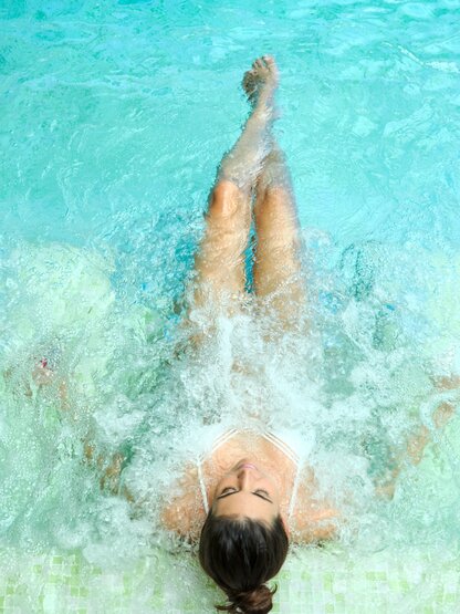 Indoor pool with guest